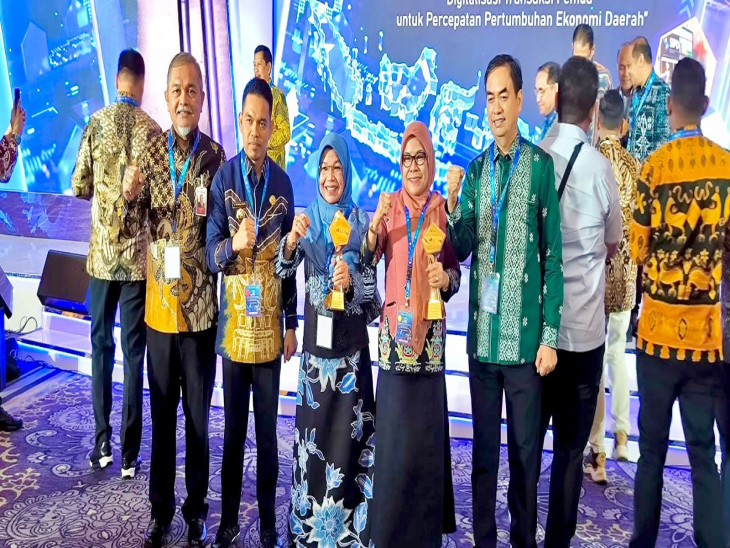 PEMKAB KAMPAR RAIH PENGHARGAAN TP2DD KABUPATEN TERBAIK SE- SUMATERA TAHUN 2024